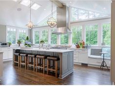 a large kitchen with an island and lots of counter space