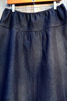 "For the skirt with Apron pockets: https://www.etsy.com/listing/157601105/dark-denim-jean-skirt-round-side-pockets?ref=shop_home_active_12 SKIRT DETAILS This semi-flaird, a line, pull on skirt is very unique and fun! You can wear it on your hips or waist with the flexibility of the elastic waistband. I custom make each one to your exact size out of any fabric you heart desires. It features a drop waistband that is cut on the bias so there's little to no bunching from the elastic so it fits flat Denim Lined Skirt In Dark Wash, Relaxed Denim Skirt With Elastic Waistband, Relaxed Fit Denim Skirt With Elastic Waistband, Flared Cotton Denim Skirt With Pockets, Cotton Denim Flared Skirt With Pockets, Relaxed Fit Dark Wash Skirt With Pockets, Dark Wash Denim Skirt With Lining, Flared Denim Skirt With Pockets, Dark Wash Relaxed Fit Skirt With Pockets