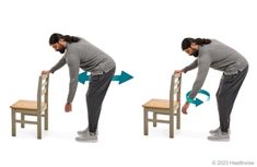 a man standing on top of a wooden chair while holding his leg up to the side