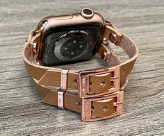 High Quality Italian Tan Color Vegan Leather Strap Bracelet. Double Strapped 7mm Strap with Adjustable Buckles. Gorgeous Design Bracelet Tailored to Perfection. Designed And Handmade by Simeon D Jewelry Studio. This Bracelet Fits ALL Apple Watch Series. Please Measure Your Wrist Before Submitting Your Order! Not For Other Models. Apple Watch Is NOT Included. Ultra Fiber Vegan Leather: -Moisture-Wicking and Heat-Dispensing -Water-Washable -Breathable -Lightweight Let's be Friends! Follow my Studi Adjustable Rectangular Apple Watch Band, Gold Bracelet Strap Watch Band For Everyday Use, Adjustable Rectangular Apple Watch Band With Bracelet Strap, Trendy Adjustable Watch Bands For Everyday, Luxury Adjustable Watch Bands For Everyday, Trendy Adjustable Apple Watch Band For Everyday Use, Adjustable Gold Watch Band For Everyday Use, Gold Apple Watch Band For Everyday Use, Everyday Rectangular Bracelet Watch Band