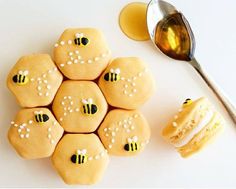 some cookies are arranged in the shape of honeybees