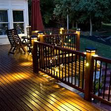 the deck is lit up with some lights