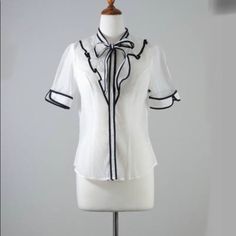 New With Tags Haute Monde Short Sleeve Blouse. Size Large. Ties At Neck. Button Up. Sheer. No Trades Bin 100 (145) White Office Lady Top With Button Closure, White Office Lady Tops With Buttons, Chic White Blouse For Office Wear, Chic White Office Wear Blouse, White Fitted Tops For Office Ladies, White Buttoned Office Lady Blouse, White Buttoned Blouse For Office, White Button-up Office Lady Blouse, White Button-up Office Blouse