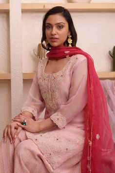 Pink kurta with bead, floral embroidery. Paired with sharara and dupatta.
Component: 3
Pattern: Embroidery
Type Of Work: Bead, floral
Neckline: Round
Sleeve Type: Three quarter
Fabric: Organza, tissue
Color: Pink
Other Details: 
Scallop bordered sheer dupatta
Occasion: Mehendi and Haldi - Aza Fashions Anarkali Sets With Dori Work On Chinon, Traditional Drape Palazzo Set With Dori Work For Eid, Eid Palazzo Set With Dori Work In Traditional Drape, Designer Organza Sharara With Straight Kurta, Sharara With Dabka Work And Straight Kurta In Organza, Organza Sharara With Straight Kurta For Eid, Chikankari Embroidery Floor-length Sets In Chinon, Embroidered Chinon Sharara For Reception, Eid Organza Sharara