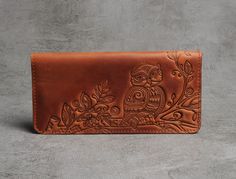 Gorgeous wallet with embossed Owl pattern made from very soft and durable leather of premium quality. Outside,the leather is covered with wax, looks very elegant  and femine, really pleasant to touch.   Like all of our products, this wallets  will last for years, at the same time without losing their appearance. Dimensions (closed): 8*4 inches 💰Unlock savings with promo code SAVE20 when you buy 3 or more items and enjoy great discounts! https://leathercraftsua.etsy.com?coupon=SAVE20 Brown Embossed Wallet For Daily Use, Brown Embossed Wallets For Daily Use, Brown Embossed Wallet, Brown Embossed Leather Wallet, Brown Hand Tooled Trifold Wallet, Elegant Brown Textured Leather Wallet, Custom Brown Hand Tooled Wallets, Owl Pattern, Owl Patterns