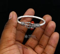 925 sterling silver handmade gorgeous customized design Shiva trident baby bangle bracelet, excellent personalized gifting kids jewellery from india. Metal-925 silver. Item type-Baby kada Weight-6.780 grams.(single) Size-4.0 cm or 1.5 " inner diameter) Width-2.5 mm. Quantity-1 piece Make excellent gifting for birthday , mother's day, wedding, anniversary, father's day, Christmas day, valentines day, Adjustable Traditional White Gold Bangle, Symbolic Round Jewelry For Puja, Adjustable Silver Jewelry For Rituals, Adjustable White Jewelry For Puja, White Fusion Jewelry For Puja, White Adjustable Temple Jewelry, White Fusion Style Jewelry For Puja, Traditional White Sterling Silver Bracelets, White Round Jewelry For Rituals