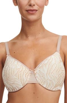 Designed to minimize your bustline by one inch, this seamless underwire bra smoothes and shapes your form with wide, smoothing back wings that eliminate bulge. Nordstrom Exclusive Color: Ivory 76% polyamide, 24% elastane Hand wash, line dry Imported Lingerie Full Coverage Cream Bra With Removable Pads, Cream Full Coverage Bra With Removable Pads, Elegant Padded Beige Bra, Elegant Beige Seamless Bra, Elegant Nursing Bra With Moderate Coverage, Beige Underwire Bra With Moderate Coverage, Elegant Shaping Underwire Bra, Beige Seamless Underwire Nursing Bra, Elegant White Nursing Bra With Medium Support