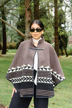 ALLPA, which means Earth, is a unique design inspired by our land, in our origins, combining the city with the countryside, colors and lines. They are perfect to keep us warm during the cold season, they are lightweight and they are not itchy. All our ponchos are made by women from Cotopaxi - Ecuador. Cozy Brown Poncho For Outdoor, Brown Long Sleeve Poncho For Outdoor, One Size Outdoor Cape Outerwear, One Size Outdoor Cape, Bohemian One Size Outerwear For Outdoors, One Size Cape For Outdoor, Nordic Style Outerwear For Fall Outdoor Activities, Nordic Outerwear For Fall Outdoor Activities, Casual One-size Outdoor Outerwear