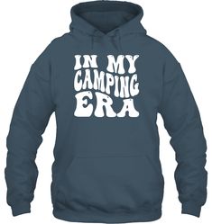 Get ready to explore the great outdoors with our "In My Camping Era" T-Shirt! Perfect for adventurers, nature lovers, and anyone who feels at home under the stars, this tee is your ultimate companion for outdoor escapades. Features: Adventure-Ready Comfort: Made from soft, breathable cotton, this t-shirt ensures maximum comfort whether you're setting up camp, hiking trails, or relaxing by the campfire. Nature-Inspired Design: The "In My Camping Era" graphic captures the spirit of adventure and y Winter Camping Hoodie With Letter Print, Hooded Sweatshirt With Letter Print For Camping, Hooded Letter Print Sweatshirt For Camping, Letter Print Hoodie Sweatshirt For Outdoor Activities, Casual Hoodie With Letter Print For Camping, Adventure Hooded Hoodie With Letter Print, Hooded Sweatshirt With Letter Print For Hiking, Hooded Letter Print Sweatshirt For Hiking, Crew Neck Sweatshirt With Adjustable Hood For Outdoors