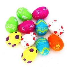 an assortment of painted easter eggs on a white background