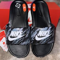 Men’s Size 6 (Women’s Size 7.5, But Also Fits An 8 Considering These Slides Don’t Come In Half Sizes). Brand New & Never Worn! Upper Contains Synthetic Leather. Black Nike Sneakers With Logo Print, Casual Slip-resistant Slides For Training, Casual Low-top Synthetic Slides For Streetwear, Casual Sports Slides With Round Toe, Sporty Gray Slip-on Slides, Casual Round Toe Slides For Sports, Nike Casual Slides With Cushioned Footbed, Comfortable Black Sneakers For Training, Comfortable Black Training Sneakers