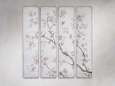 four panels with flowers and birds painted on them in white, gold and grey colors