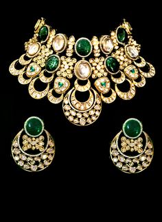 Kundan bridal choker with emerald gems Luxury Kundan Statement Jewelry, Luxury Green Kundan Choker, Hand Set Choker Necklace For Receptions, Hand-set Choker Necklace For Receptions, Dazzling Chandbali Jewelry For Celebration, Elegant Hand Set Choker For Festive Occasions, Elegant Hand Set Festive Choker, Dazzling Gemstone Jewelry For Reception, Elegant Festive Hand-set Choker