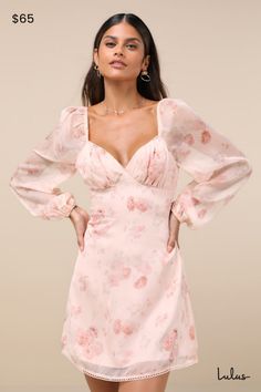 You'll be ready for date night in an instant with the Lulus Lovely Poise Light Pink Floral Tie-Back Long Sleeve Mini Dress! A romantic floral design accents the sleek and airy woven chiffon as it shapes lightly gathered cups and a sweetheart neckline with crocheted ladder lace, all framed by semi-sheer, long balloon sleeves (with elastic at the shoulders and cuffs). The subtle, fit-and-flare silhouette naturally flatters the figure, while an open back with double tying straps and a mini hem (accented with matching ladder lace trim) lends an extra flirty finish. Hidden back zipper/clasp. Fit: This garment fits true to size. Length: Mid-thigh. Bust: Great for any cup size. Waist: Fitted - very fitted at natural waist. Hip: Not Fitted - fuller skirt allows room for hips. Undergarments: May be Light Pink Floral Dress, Pink Long Sleeve Dress, Light Pink Dress, Pink Dress Casual, Date Night In, Lace Dress With Sleeves, Pink Floral Dress, Long Sleeve Floral Dress, Long Sleeve Mini