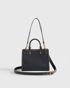 Meet our Italian Leather Mini Convertible Satchel, the perfect stylish yet versatile piece to add to your collection. Made from high-quality Italian leather, this bag features three carrying options, allowing you to wear it as a crossbody bag, shoulder bag, or carry it as a handbag. The compact size paired with the multiple compartments and pockets makes this bag ideal for carrying your essentials while on the go. With its timeless design and impeccable craftsmanship, this satchel is sure to bec Mini Convertible, Silk Cami, Quarter Zip Sweater, Scarf Gift, Taupe Color, Leather Mini, Bag Shoulder, Italian Leather, Timeless Design