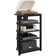 a record player stands on top of a shelf