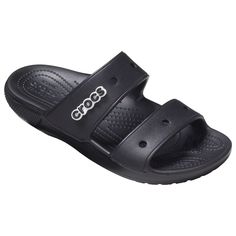 Crocs Classic Sandals For Ladies Bring Wonderful Comfort, Fun Style, And Acclaimed Durability For Welcome Performance With Every Wear. These Crocs Boast Legendary Croslite Foam Cushioning For A Pillowy Feeling With Every Step. Durable Build Quality And Unmistakable Crocs Style Make These Sandals A Perfect Fit For A Variety Of Settings And Occasions. * Croslite Foam Cushioning * Stylish Design * Proven Durability Classic Black Slip-on Slides, Classic Black Slippers For Summer, Classic Black Flat Slides, Classic Black Summer Slippers, Classic Black Sandals With Cushioned Footbed, Classic Black Flip Flops With Cushioned Footbed, Comfortable Non-slip Black Sandals, Classic Synthetic Sandals For Beach, Classic Black Cushioned Flip Flops