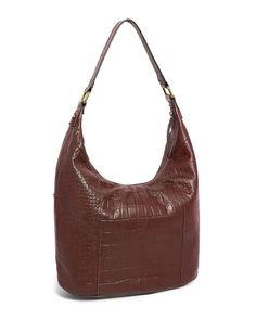 Soft and slouchy, our Carrie Hobo has a unique shape that fits comfortably on your shoulder. Crafted from the finest American glove leather and featuring a secure zippered compartment, this hobo bag epitomizes everyday classic design. 100% Genuine American Leather Antiqued Hardware 2 exterior front slip pockets Top zip closure 2 interior slip pockets and 1 zip pocket Shoulder drop: 14" 15.5" W x 9.5" H x 5" D Weight: 1.4lbs Our products are made from high quality American leather intended to las Antique Hardware, American Leather, Oat Milk, Pocket Top, Leather Hobo, Leather Gloves, Hobo Bag, Classic Design, Carry On