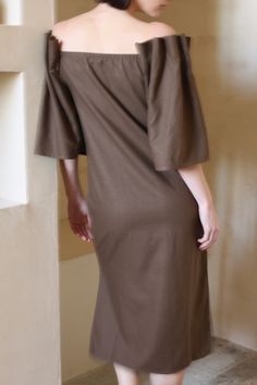 The Talu Dress in silk canvas is a stunning creation crafted from our most coveted fabric to date - our warm and structured, Silk Canvas. The Talu Dress features dramatic open bell sleeves with intricate accordion pleat detailing that evokes romantic vintage inspiration, yet is balanced with a straight-forward body that gently skims ones frame with useful side slits to create ease with movement. We envision styling this one-of-a-kind piece with eye catching jewelry pieces and setting the stage w Elegant Cotton Dress With Elastic Sleeves, Elegant Cotton Dresses With Elastic Sleeves, Elegant Cotton Dress With Ruffle Sleeves, Fitted Cotton Midi Dress With Flutter Sleeves, Elegant Cotton Midi Dress With Gathered Sleeves, Elegant Cotton Midi Dress With Pleated Sleeves, Spring Midi Dress With Bell Sleeves And Pleated Details, Spring Midi Dress With Bell Sleeves And Pleats, Elegant Bell Sleeve Dress For Daywear