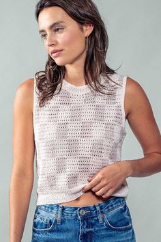 Unleash your inner style with our chic Checkmate top. This sleeveless crochet knit top features a delicate pink and lavender checkered pattern, adding a touch of elegance to any outfit. Perfect for the fashion-forward individual looking for a luxurious and exclusive addition to their wardrobe. 40% Polyester, 40% Acrylic, 20% Rayon See size chart for size details Some stretch Trendy Textured Knit Sweater Vest For Summer, Summer Layering Pointelle Knit Sweater Vest, Chic Textured Knit Sweater Vest For Summer, Trendy Spring Sweater Vest In Pointelle Knit, Chic Sleeveless Crochet Top With Textured Knit, Trendy Open Knit Sweater Vest For Spring, Spring Cotton Open Knit Sweater Vest, Sleeveless Pointelle Knit Crochet Top For Layering, Cotton Pointelle Knit Sleeveless Tank Top