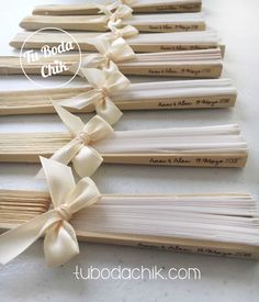 several wooden skewers with ribbons tied together