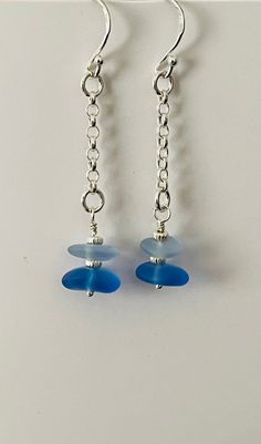 Sterling silver Sea glass drop earrings, with a 2.3mm chain, 2 piece of glass separated by starting silver bead the sea-glass is diff sizes I tried to get as close as possible but all are slightly different will come gift boxed ready for you to gift or even treat yourself, Thankyou kindly for looking have a great day x Silver Hypoallergenic Sea Glass Earrings, Silver Hypoallergenic Earrings With Sea Glass, Hypoallergenic Silver Sea Glass Earrings, Elegant Silver Sea Glass Earrings, Silver Sea Glass Drop Earrings, Silver Sea Glass Earrings For Gift, Nickel-free Silver Earrings In Recycled Glass, Nickel-free Silver Earrings With Recycled Glass, Silver Sea Glass Dangle Earrings