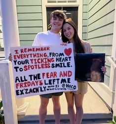 two young people holding up signs in front of a house that says, i remember everything from your ticking heart to spotless smile all the fear and friday's left me ex