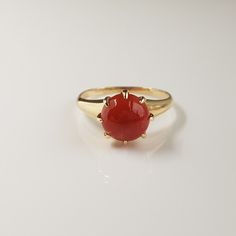 RING DETAILS:✪Design: Gold ring✪Gemstone: Natural coral✪Gemstone color: Red✪Gemstone size: 9mmGemstone weight: 2.15mm✪Gemstone shape: Round✪Setting type: ProngGold weight: 2 gram✪Metal type: 14k solid yellow gold✪Metal finish: Smooth shinyChoose your ring size from drop down menu and if you need any other preferred ring size please contact us.**********************************QUALITY OF MATERIALS:Metal: Most of our jewelry at JewelryMansion is made with precious metals like gold and silver. Thes Classic Opal Birthstone Ring With Round Band, Formal Ruby Gemstone Ring, Classic Red Birthstone Jewelry, Formal Ruby Ring With Round Band, Red Jewelry With Round Stone In Prong Setting, Fine Jewelry Red Ruby Ring With Round Stone, Red Ruby Ring With Round Stone Fine Jewelry, Red Ruby Ring With Round Stone, Classic Round Gemstones With Center Stone