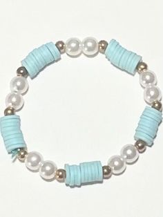 Baby Blue or light teal Bracelet  4$ Blue Bracelets Clay Beads, Mexico Bracelets Clay Beads, Aesthetic Homemade Bracelets, Teal Bracelet Ideas, Good Clay Bead Bracelet Ideas, Blue Bracelets Aesthetic, Cute Clay Bead Bracelet Ideas Winter, Light Blue Clay Bead Bracelet, Blue Diy Bracelet