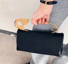 Very nice looking purse, has comfortable handle has multiple colors in stock right now, 3 gray, 5 black, 3 red, 3 blue. Luxury Bags With Brass Hardware, Luxury Bags With Detachable Handle For Fashion Statement, Luxury Modern Shoulder Bag With Handles, Luxury Modern Evening Bag With Round Handle, Luxury Bags With Metal Hardware For Fall, Luxury Structured Bags With Metal Hardware, Luxury Chic Bags With Hardware Details, Luxury Formal Bags With Rolled Handles, Luxury Top Handle Clutch With Leather Handles