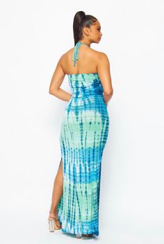 Curvaceous and colorful, this beauty is both sexy and classy Halter Neckline Bust Cut-Out Back Tie Closure Open Back Stretchy Double Side Slits Length: 58' Approx. Fabric: 95% Rayon / 5% Spandex Multicolor Vacation Dress With Back Tassel Tie-up, Tie-dye Beachwear Dress For Vacation, Turquoise Fitted Tie-side Swimwear, Summer Tie-dye Halter Neck Dress, Multicolor Tie-side Bottom Swimwear With Drawstring, Out Back, Graphic Top, Blue Tie Dye, Halter Neckline