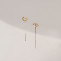 14k Real Gold Dangling Open Heart Earrings is no better way to express your love. Find the long line that connects your heart to hers. Choose a special day to celebrate your love, whether it's a birthday, an anniversary, or simply a regular Friday. D E T A I L S   * Made to Order. * 100% 14k Solid Gold * Choice of Gold Color: Yellow Gold, Rose Gold, White Gold * Chain length: 50 mm / 1.96 inch * Chain thickness: 1 mm / 0.03 inch * Charm width: 10 mm / 0.39 inch * Charm length: 8 mm / 0.31 inch * Anniversary Yellow Gold Linear Earrings, Yellow Gold Threader Earrings As A Gift, Yellow Gold Threader Earrings For Gift, Yellow Gold Tarnish-resistant Threader Earrings As Gift, Tarnish Resistant Yellow Gold Sterling Silver Heart Earrings, Gift Yellow Gold Linear Earrings With Ear Wire, Yellow Gold Heart Earrings In Sterling Silver, Elegant Heart-shaped Tarnish Resistant Earrings, Yellow Gold Linear Earrings With Ear Wire For Gift