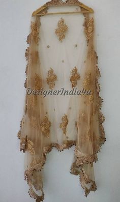 This is a Dupatta made on orders.It is made using net fabric with gold sequine embroidery all over.We stitch a beautiful golden lace to all sides of it and decorate with tassels.Dupatta is having a length of 100 inches and width of around 40 inches.I don't keep it readymade I only make it exclusively for my customers.Can be fully customised. Golden Dupatta Designs, Golden Dupatta, Girls Party Wear, Golden Lace, Bridal Dupatta, Lehenga Suit, Asian Wedding Dress, Elegant Blouse Designs, Stole Scarf