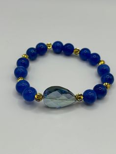 Blue jasper bracelet with accent beads. Blue jasper stone can create empowerment. It also lets you handle stressful situations calmly. Casual Blue Stretch Bracelet With Gemstone Beads, Elegant Blue Stretch Bracelet With Natural Stones, Blue Gemstone Stretch Bracelet As Gift, Everyday Blue Stretch Bracelet With Gemstone Beads, Spiritual Blue Beaded Bracelets For Everyday, Everyday Blue Gemstone Beads Stretch Bracelet, Everyday Spiritual Blue Beaded Bracelets, Blue Beaded Bracelets With Natural Stones For Healing, Blue Gemstone Beads Bracelet For Everyday