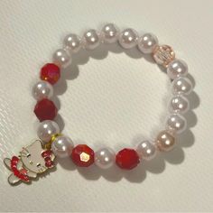 White Pearl Hello Kitty Charm Bracelet With Red Beads Hello Kitty Charm, Kitty Accessories, Hello Kitty Accessories, Red Beads, Red Bead, White White, White Pearl, Pearl White, Red White