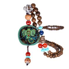 Commodity material: wooden beads+alloy

	Net weight of goods: 39g Chain Clothing, Wooden Bead Necklace, Art Necklace, Buddha Beads, Wooden Bead Necklaces, Art Necklaces, Long Beaded Necklace, Beaded Pendant Necklace, Sweater Chain