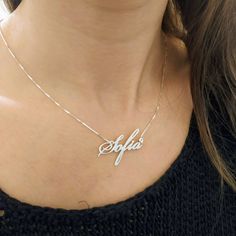 925 Silver Name Pendant - Custom Made Necklace - Personalized Jewelry - Cursive Sofia . . . . . . . . . . . . . . . . . . . . . . . . . . . . . . . . . . . . . . . . . . . . . . . . . . . . . . . . . Looking for a thoughtful gift for your loved one? You will love this high quality 925 Silver Name Pendant. This is a perfect gift for your girlfriend or wife. Personalize it with her name in a beautiful font. This lovely 925 sterling silver custom made necklace is made to order. Choose the name or w Silver Hallmarked Nameplate Jewelry, Customizable White Gold Nameplate Jewelry, Personalized White Gold Nameplate Jewelry, Anniversary White Gold Nameplate Necklace, Sterling Silver White Gold Name Necklace With Polished Finish, Silver Nameplate Jewelry For Formal Occasion, Personalized Nameplate Jewelry With Polished Finish, White Gold Sterling Silver Name Necklace With Polished Finish, Customizable Sterling Silver Necklaces For Formal Occasions