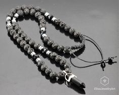 "Men's Necklace Black Onyx Lava Boho Long Adjustable Protection Yoga Mala Gemstone Hematite Beaded Necklace Gift For Him Mother's Day Gift Free fast shipping 3-5 business days delivered to the purchaser all necklaces -ALL THE PRODUCTS AT ELISAJEWELRYART ARE HANDMADE AND MADE WITH NATURAL BEADS. -WHAT DOES THE ONYX STAND FOR A powerful protection stone, Black Onyx absorbs and transforms negative energy, and helps to prevent the drain of personal energy. Black Onyx aids the development of emotiona Black Beaded Stone Necklaces For Gifts, Black Beaded Necklaces With Stones As Gift, Black Beaded Necklace With Stones, Black Lava Stone Bohemian Jewelry, Bohemian Black Lava Stone Jewelry, Black Lava Stone Necklace For Gift, Black Lava Stone Necklace Spiritual Style, Black Lava Stone Round Bead Necklaces, Black Lava Stone Jewelry With Black Beads