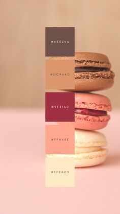 three macaroons stacked on top of each other with different colors in the background