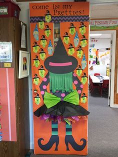 a door decorated to look like a witch