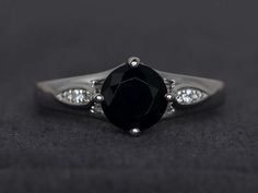 black spinel ring round cut black ring gemstone rings sterling silver party ring Elegant Black Sapphire Ring With Center Stone, Black Sapphire Ring With Brilliant Cut For Fine Jewelry, Elegant Black Sapphire Ring With Accent Stones, Classic Black Sapphire Ring Round Cut, Classic Black Sapphire Ring With Round Cut, Black Round Sapphire Ring For Anniversary, Classic Black Sapphire Ring With Brilliant Cut, Gift Black Sapphire Ring With Brilliant Cut, Black Diamonds Round Promise Ring