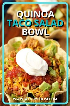 taco salad bowl with sour cream on top and the words quinoa taco salad bowl above it