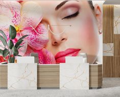 a beautiful woman with pink flowers in her hair behind the counter at a beauty salon