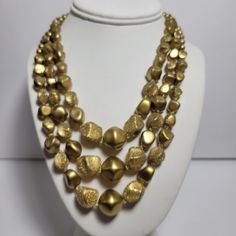 "This is a vintage 50s/60s adjustable three strand bead necklace. It has alternating beads of satin gold and shimmering golden ice. Each bead has a twisted beveled look. It can be adjusted from 16\" to 18\" with a hook closure that is stamped HONG KONG. It is in very good vintage condition. This will be a unique vintage touch for your jewelry wardrobe and it is a stand-out piece that will bring you lots of compliments. ENJOY!  I am a private collector, not a business and I'm thinning out all of 60s Jewelry, Jewelry Wardrobe, Double Strand Necklace, 60s Vintage, Vintage Glam, Jewelry Design Necklace, Agate Necklace, Multi Strand Necklace, Plastic Beads