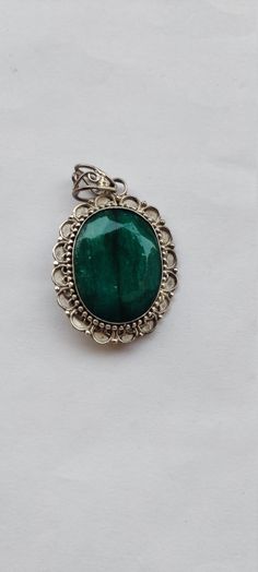 Indian big Emerald pendant Emerald pendant, Larger stone pendant. Big pendant, solid silver pendant, Handcrafted pendant, Emerald jewelry, green gemstone jewelry Stone jewelry, 925 silver pendant, Handmade pendant Gemstone - Indian Emerald[Dyed] Size=42mm[ Heght] x 32mm [width] Weight= 100 carat Material- 925 Sterling Silver, Emerald Color- Green Occasion- Wedding & Engagement & Anniversary & Birthday & Love Days & Valentine's Day & Promise Day & Huge Day, Miss You jewelry Birthstone- June Product Code = 183 Need a larger quantity ? Message us for bulk pricing in volume on this item or any other in the shop Bulk orders are welcome. Message us for more information. If you have any questions or queries, please feel free to message us !! Green Sterling Silver Pendant Gemstone, Emerald Pendant Gemstone, Hallmarked Green Pendant Gemstones, Green Large Stone Pendant Gemstones, Large Green Pendant Gemstones, Promise Day, Green Stone Pendant, Big Pendant, Dainty Pendant