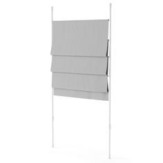 a white wall mounted towel rack with three towels hanging on it's sides and two folded