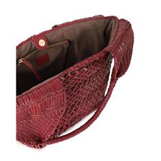 a red woven purse on a white background