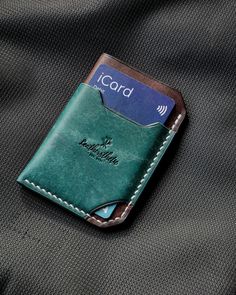 Introducing the perfect solution for those who prefer a minimalist and practical approach to wallet organization. This leather business card holder is designed for individuals who carry only a few cards and want to avoid carrying coins. Elevate your everyday style with this personalized mini wallet. DETAILS: -Crafted from premium Italian full grain leather (makes up roughly 10% of all leather available today and you can own something really unique! ) -Develops a unique patina over time, adding c Green Leather Card Holder With Rfid Blocking, Green Leather Card Holder For Everyday Use, Green Leather Rfid Blocking Card Holder, Green Rfid Blocking Card Holder For Everyday, Green Bifold Card Holder With Interior Slots, Green Bifold Card Holder For Everyday Use, Leather Business Card Holder, Leather Cardholder, Classic Fonts