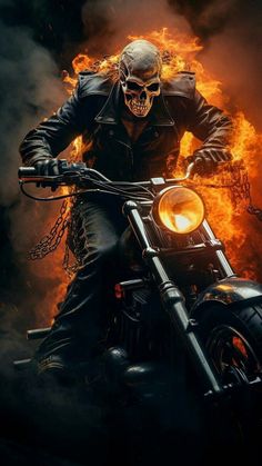 a man riding on the back of a motorcycle in front of a large fire filled sky