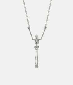 Designed with movable joints, the Skeleton Long necklace features a dangling skeleton charm carrying our orb motif in its hands. Skeleton Silhouette, Punk Aesthetic, The Skeleton, A Skeleton, Mens Jewelry Necklace, Vivienne Westwood, Chain Lengths, Long Necklace, Womens Jewelry Necklace